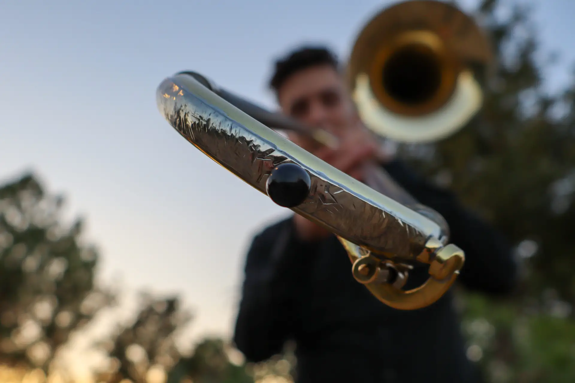 trombone slides closeup image from a downward angle